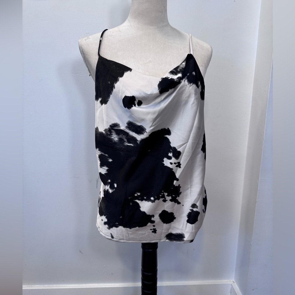 Never worn! Cow print